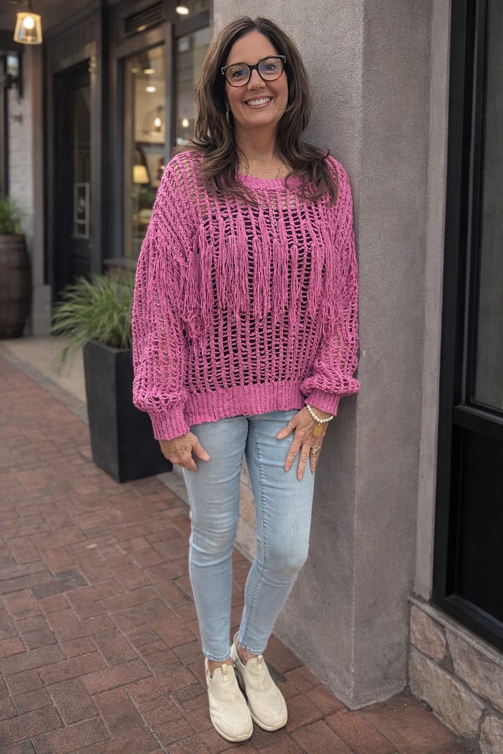 The “Pink Pony Fringe Sweater”