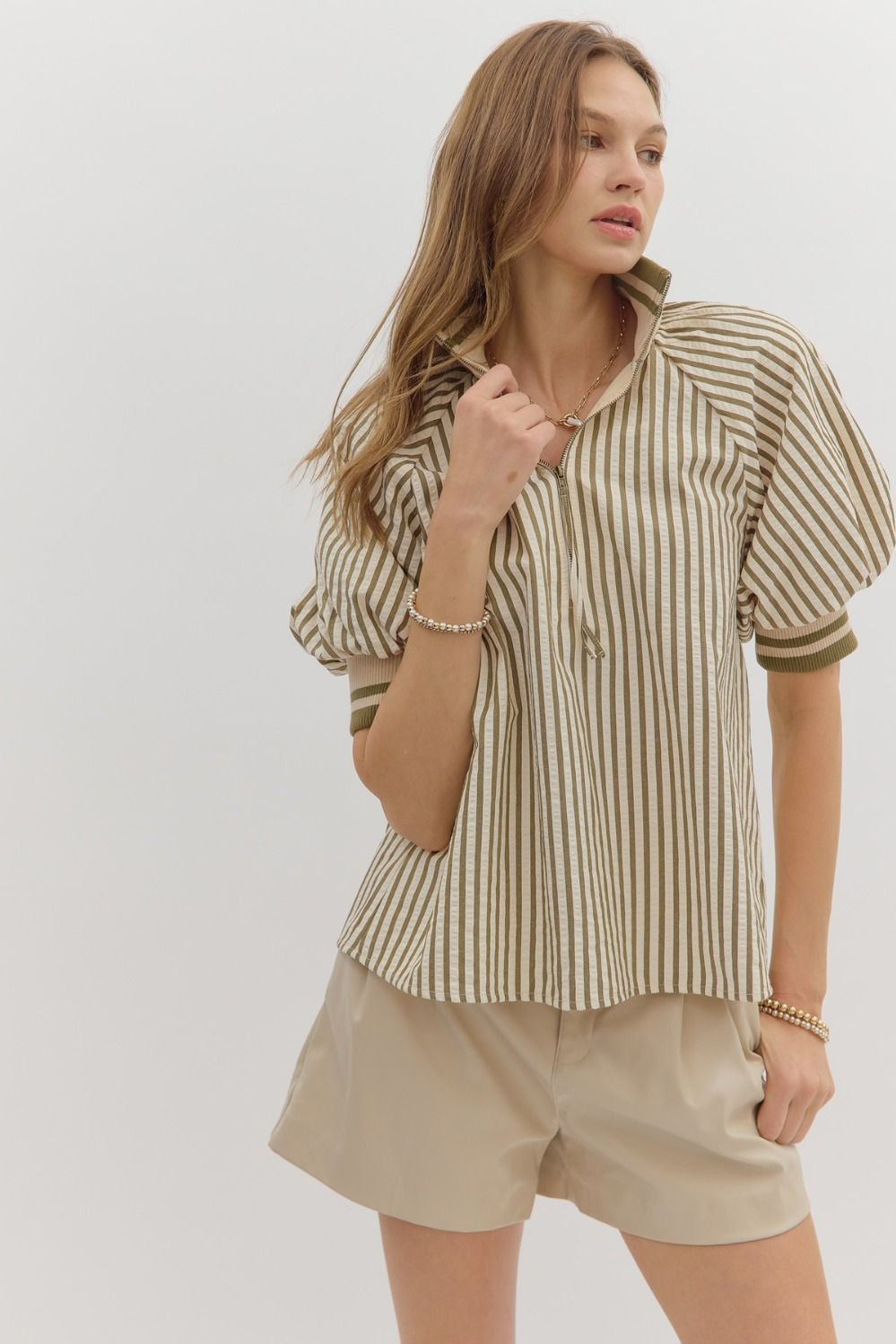 Stripe pattern half-zip closure top