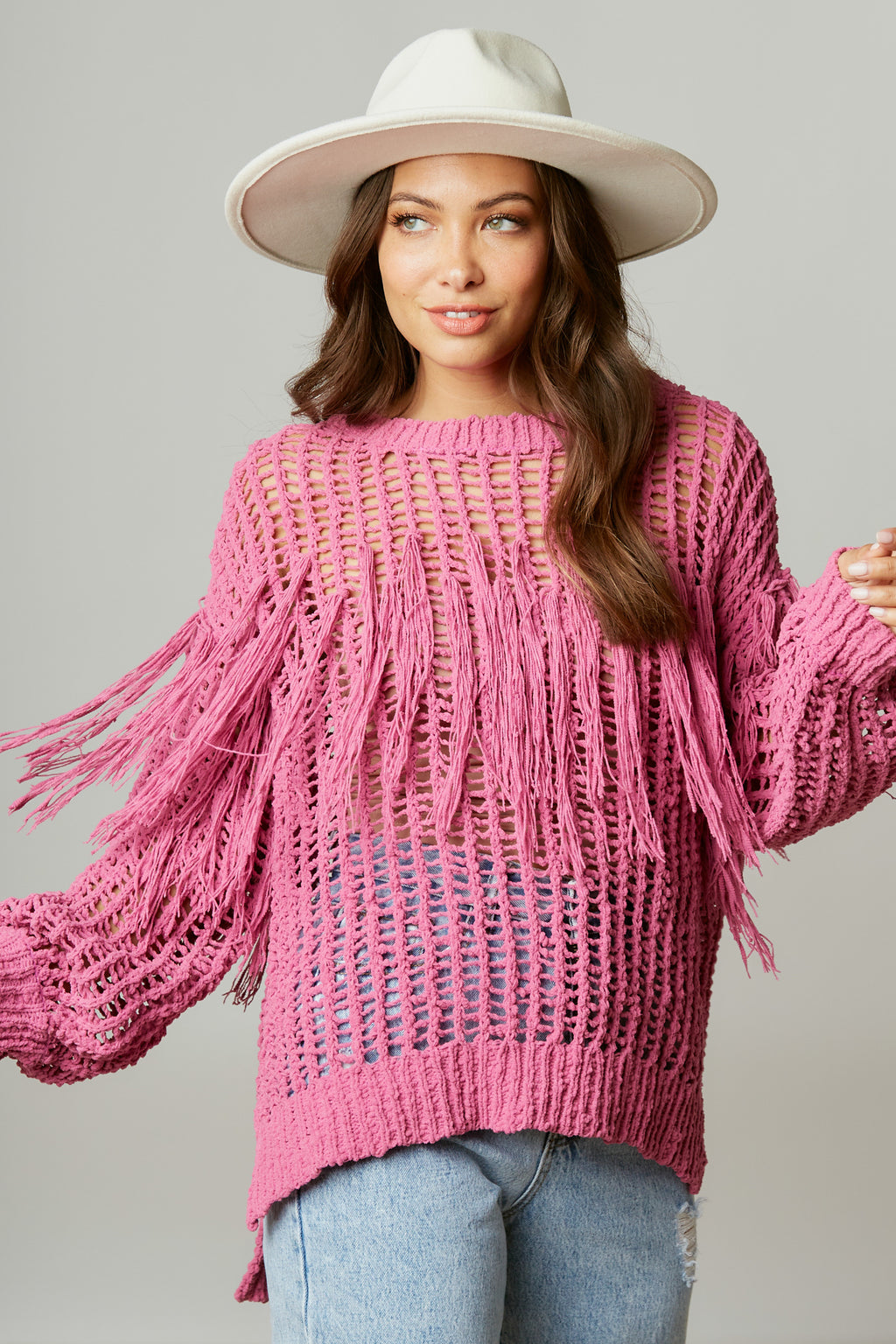 The “Pink Pony Fringe Sweater”