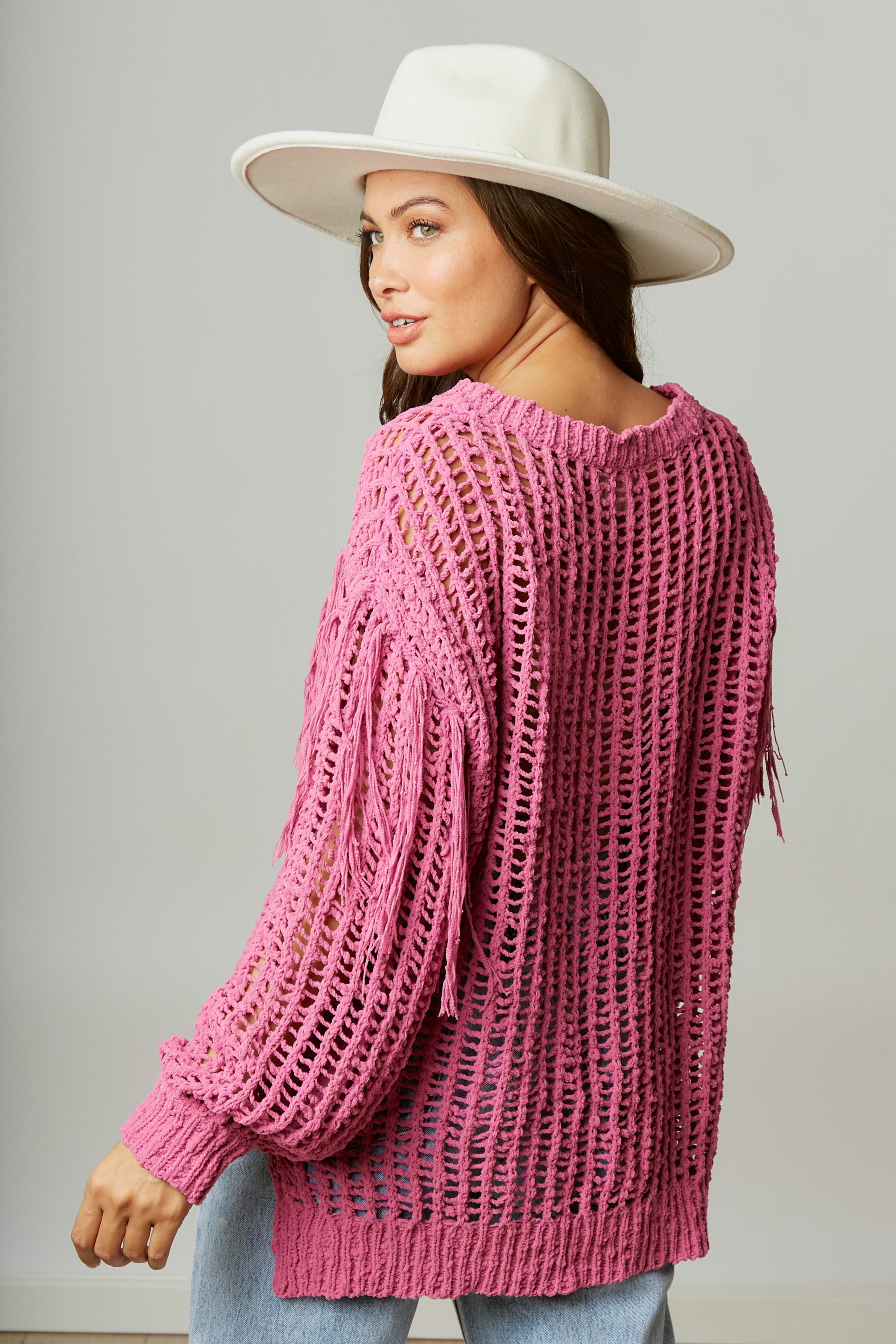 The “Pink Pony Fringe Sweater”